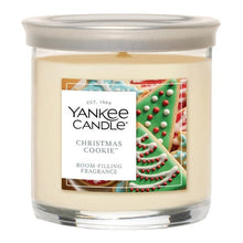 Yankee Candle Christmas Cookie cream tumbler candle in a clear glass jar