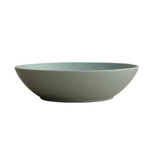 Gray-green bowl with curved sides, matte dinnerware style