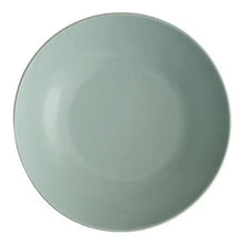 Mint green round ceramic bowl with smooth glossy interior