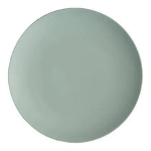 Light green round dinner plate, single close-up view with smooth finish