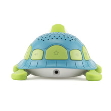 Green and blue turtle-shaped sound machine with star and moon buttons