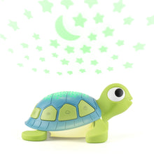 Yogasleep baby sound machine shaped like a green and blue turtle