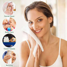 White face towel wiping a woman’s cheek for facial cleansing