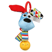 Dog-shaped fabric baby rattle with striped legs and yellow ball base, red hanging tail