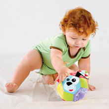 Colorful plush glow ball with cow face, fabric panels, and textured side wings