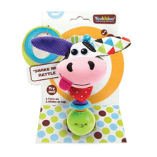 Packaged Shake Me rattle cow plush toy with green base