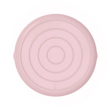 Pink round lid piece for flex storage bin, with molded circular rim detail