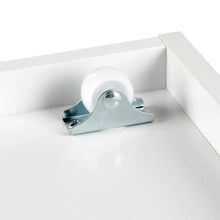 Metal caster wheel inside white storage cabinet for rolling bin
