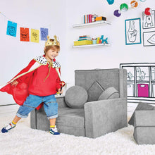 Gray kids convertible play fort with sofa-like cushions, round seat sections, and ramp piece