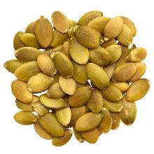 Hulled green pumpkin seeds pile
