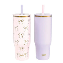 Double-wall stainless tumbler set: pink bow-pattern and lilac plain, gold rims, straws up