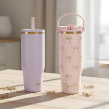 Double-wall tumbler set: lilac plain and pink bow-pattern with gold rims and straws