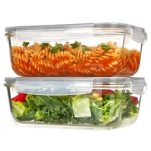 Large clear glass meal prep containers with snap airtight lids holding cooked food