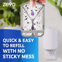 Zevo insect trap cartridge held by hand, showing trapped insects on grid