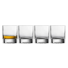 Set of 4 clear whiskey glasses with faceted base band; one glass has amber liquid