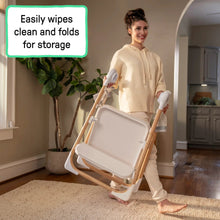 White 2-in-1 step stool with light-wood legs and foldable design for storage