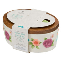 Floral ceramic butter dish with acacia wood lid and cutout for serving knife