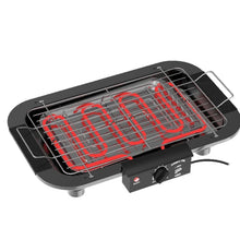 Electric smokeless grill with heating element lines inside the open base, black.