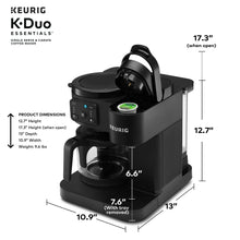 Black Keurig dual coffee maker in side view with open lid and drip tray