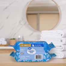 Flushable wipes multipack with 84 total wipes, blue-and-white package on bathroom counter
