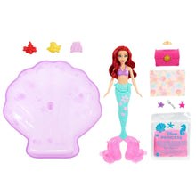 Mermaid doll with seashell-shaped pool and included molds and sand accessories