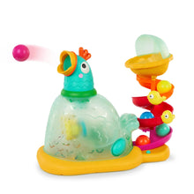 Chicken ball popper toy with translucent dome, yellow chicks, and stacked rings