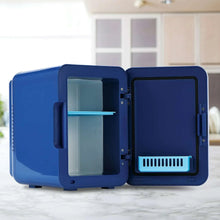Blue mini thermoelectric cooler with door open, showing an inner compartment.