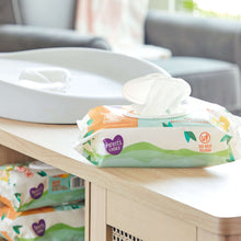 Baby wipes pack with one wipe pulled out, soothing shea butter, 'Do not flush'.