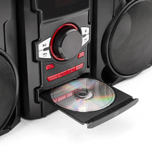 Stereo speaker system with CD tray holding a compact disc
