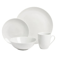 White ceramic coupe bowls and mug set with several pieces stacked in a display.