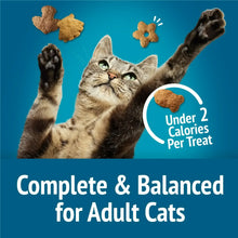 Tabby cat reaching for crunchy treats, badge reads Under 2 Calories per treat