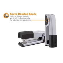 Silver handheld stapler with upright handle and black magazine