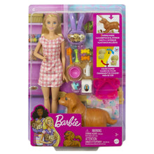 Blonde fashion doll with brown puppy and accessories in clear blister packaging