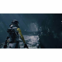 Returnal PS5 game art featuring astronaut holding a weapon in a dark cave