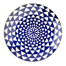 Blue ceramic dinner plate with concentric geometric medallion design