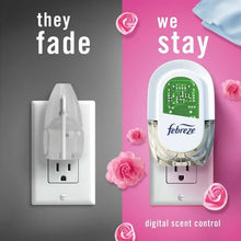Febreze Plug air freshener device with green digital scent control display
