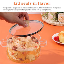 Glass cooking pot with lid, clear ribbed body and handles, lid being lifted