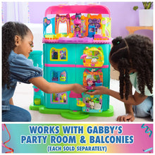 Party room dollhouse with open teal rooms and hanging interior shelves