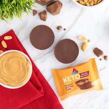 Dark chocolate peanut butter cups with peanut butter spread and Keto cups box
