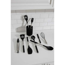 Black silicone utensil set with ribbed holder and multiple cooking tools