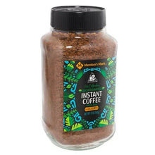 Instant coffee jar with black lid and green/black front label for decaffeinated coffee