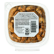 Back label on clear cashew clamshell with nutrition info and barcode