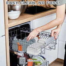 Stainless steel lunch containers with grey silicone lids on dishwasher rack, ready to clean