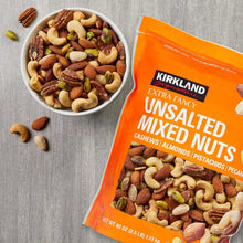 Pouch of unsalted mixed nuts beside a bowl of mixed nuts