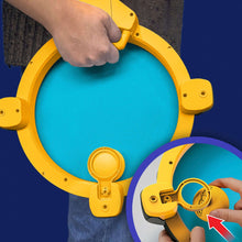 Yellow electronic game ring with blue center and handheld launcher ball
