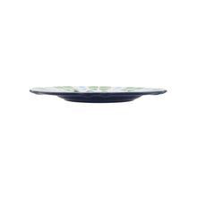 11-inch dinner plate, side view with dark blue rim and green/blue patterned edge