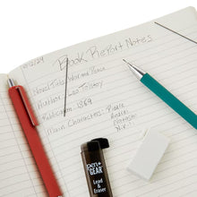 0.7mm mechanical pencil writing on lined notebook with lead-and-eraser