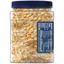 Jar back label with nutrition facts for dry roasted salted peanuts and peanuts inside