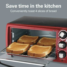 Red countertop toaster oven with open door, toasting four bread slices on the tray