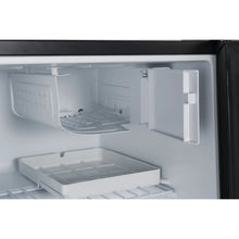 Refrigerator interior with wire shelf and side door compartments in white
